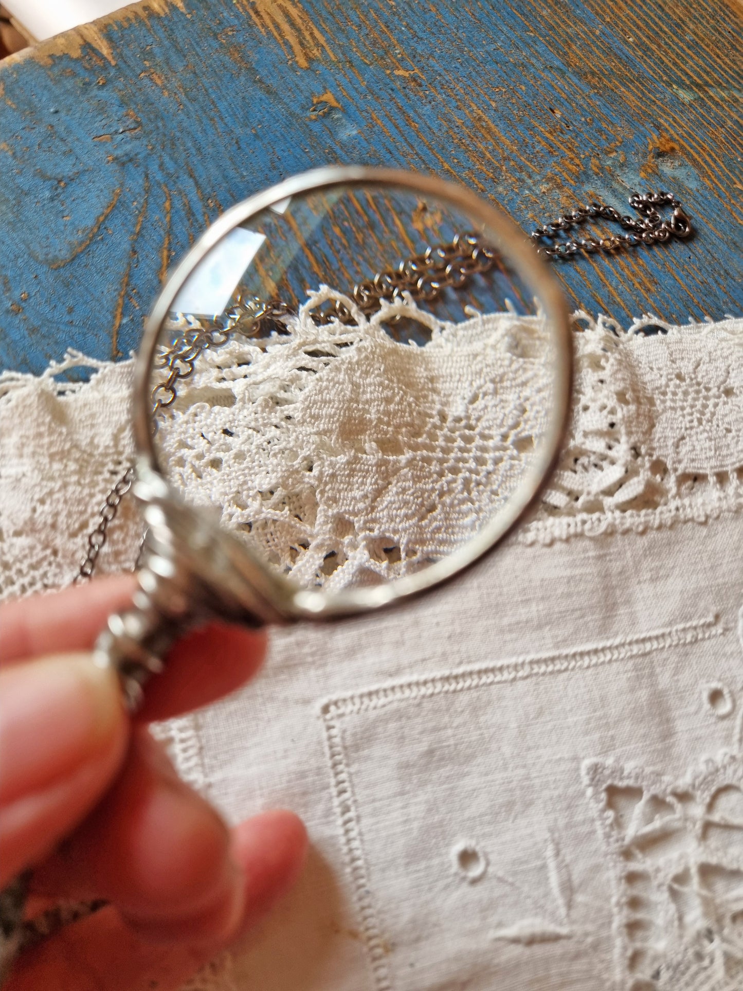 Magnifying Glass Loupe Necklace, with Rooster feather.