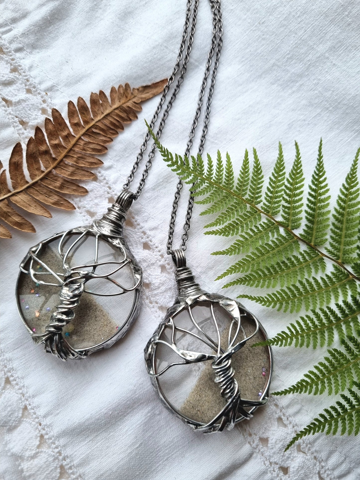 Tree of life necklace, with moving sand.