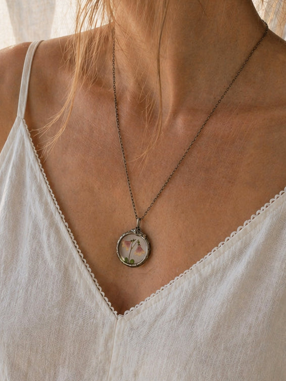 Twinflower Linnea Small Terrarium Necklace with real, pressed flower.