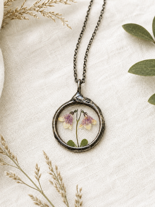 Twinflower Linnea Small Terrarium Necklace with real, pressed flower.