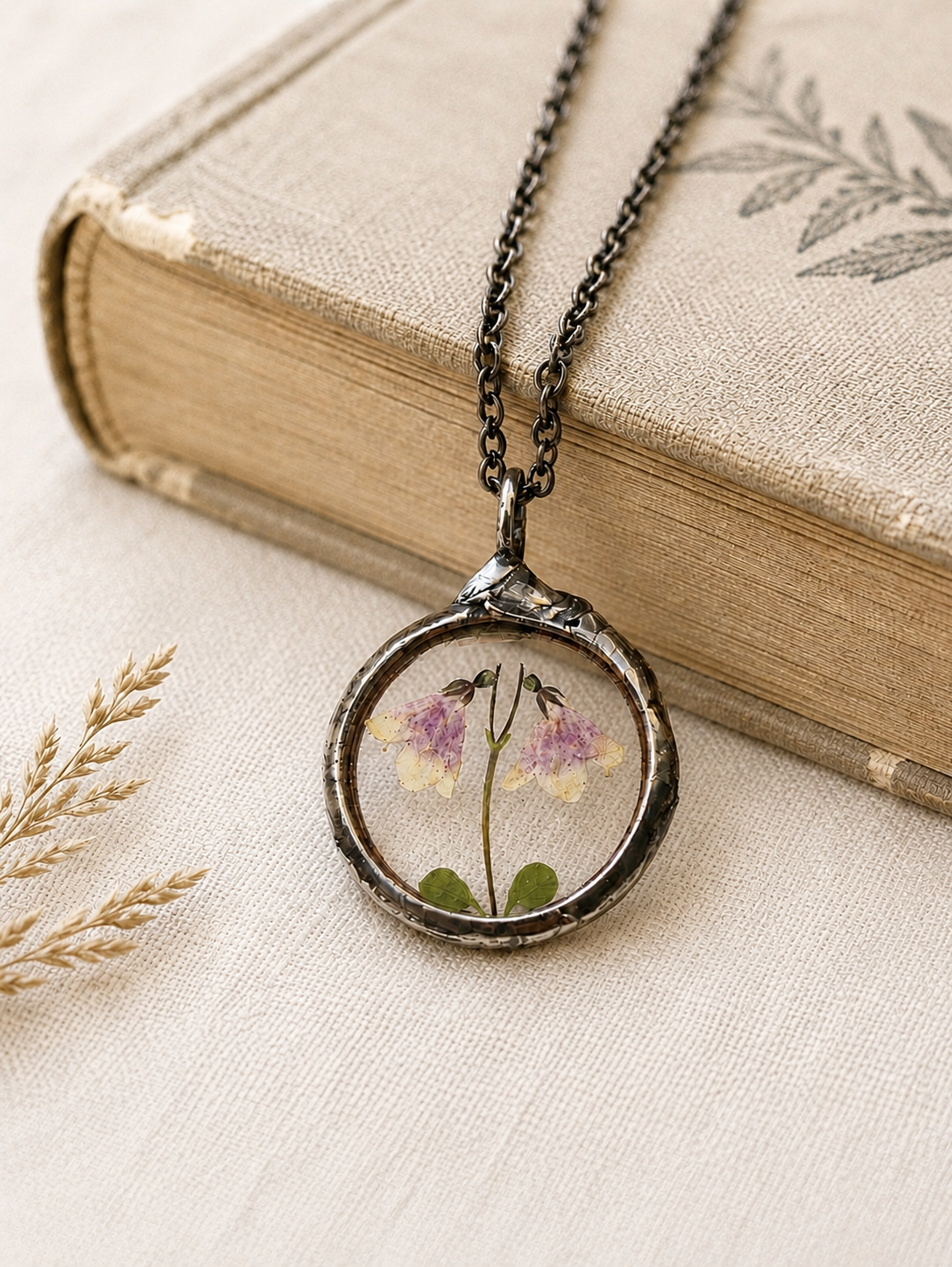 Twinflower Linnea Small Terrarium Necklace with real, pressed flower.